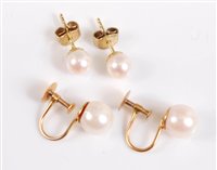 Lot 2510 - Two pairs of cultured pearl earrings, the 6mm...