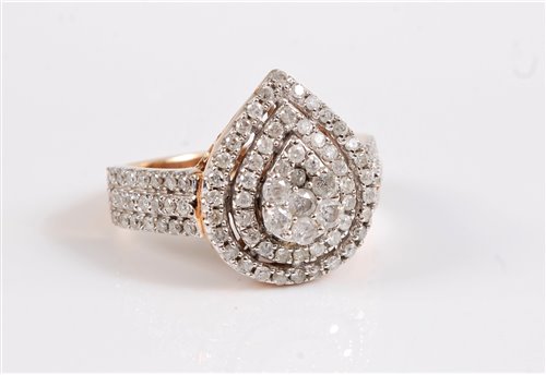 Lot 2608 - A 9ct diamond cluster ring, the pear shaped...