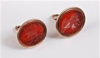 Lot 2509 - Two carnelian fobs/seals, the first oval...