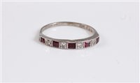 Lot 2623 - An 18ct and platinum ruby and diamond ring,...