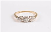 Lot 2636 - An 18ct and platinum three stone diamond ring,...