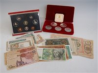 Lot 2080 - Mixed lot of coin sets and world banknotes, to...
