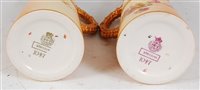 Lot 1049 - *A near-pair of Royal Worcester porcelain...