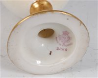 Lot 1044 - *A Royal Worcester porcelain ovoid pedestal...