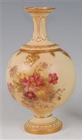 Lot 1053 - *A Royal Worcester porcelain blush ivory vase,...