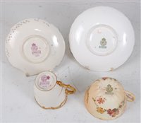 Lot 1065 - *A Royal Worcester reticulated cabinet cup and...