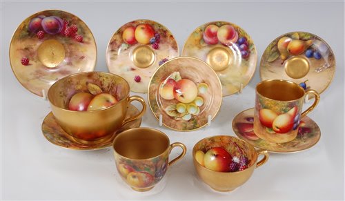 Lot 1032 - *A Royal Worcester porcelain teacup and saucer,...
