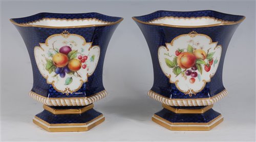 Lot 1061 - *A pair of Royal Worcester porcelain vases,...