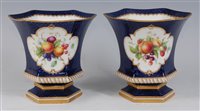 Lot 1061 - *A pair of Royal Worcester porcelain vases,...