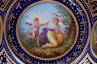 Lot 1074 - *A 19th century Vienna porcelain chocolate cup...