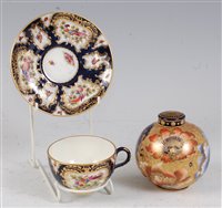 Lot 1066 - *A Royal Worcester porcelain teacup and saucer,...
