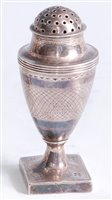 Lot 1109 - A George III silver pedestal pepperette, of...