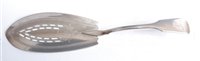 Lot 1130 - A George III silver fish slice, in the Fiddle...