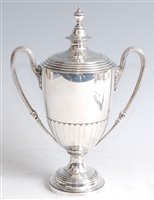 Lot 1118 - *A late Victorian silver pedestal twin handled...