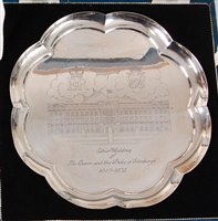 Lot 137 - *A cased silver commemorative tray, of lobed...