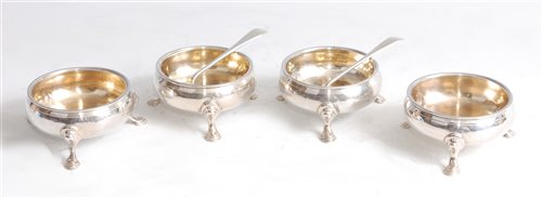 Lot 1112 - *A set of four George III silver open salts,...
