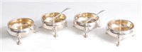 Lot 1112 - *A set of four George III silver open salts,...