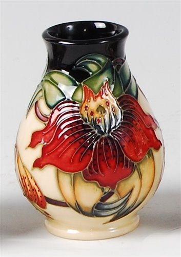Lot 16 - A small Moorcroft pottery vase in the Anna...