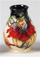 Lot 16 - A small Moorcroft pottery vase in the Anna...