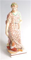 Lot 1090 - A 19th century Staffordshire figure of a lady,...