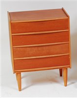 Lot 403 - A 1960s Danish teak four drawer bedside chest,...