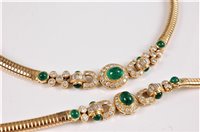 Lot 1214 - An 18ct emerald and diamond necklace and...