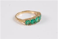 Lot 1179 - A five stone emerald ring, the five graduated...