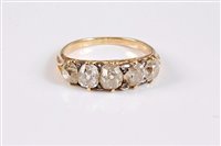 Lot 1209 - A five stone diamond ring, the five graduated...
