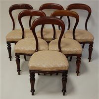 Lot 1591 - A set of six Victorian mahogany balloon back...