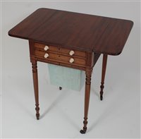 Lot 1581 - A Regency mahogany work table, the hinged...