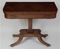 Lot 1593 - A Regency mahogany and ebony strung card table,...