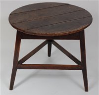 Lot 1606 - An 18th century oak cricket table, the...