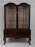 Lot 1579 - *An Edwardian mahogany double dome topped...