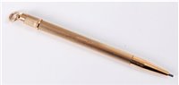 Lot 360 - A 9ct gold propelling pencil, the engine...