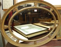 Lot 1025 - A gilt composition framed and and bevelled...