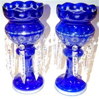 Lot 1 - A pair of Bohemian style blue overlaid glass...