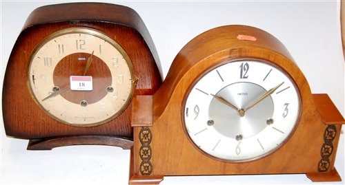 Lot 18 - A 1950s Smiths oak cased mantel clock together...