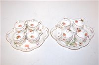 Lot 134 - A set of four Coalport strawberry pattern cups...