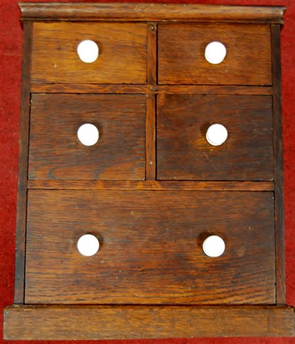 Lot 150 - A Victorian oak collector's chest having four...