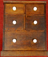 Lot 150 - A Victorian oak collector's chest having four...