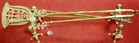 Lot 151 - A set of three brass fire irons with dogs