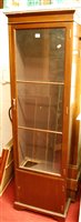 Lot 1133 - A reproduction mahogany single door glazed...