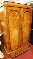 Lot 1134 - A mid-Victorian figured walnut round cornered...