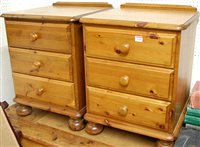 Lot 1146 - A pair of modern pine round cornered three...