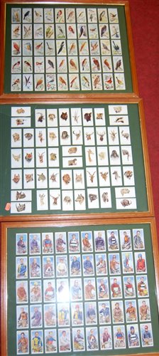 Lot 172 - A large quantity of tea cards, three framed...