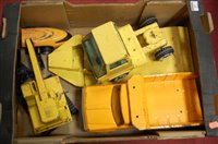 Lot 85 - A small collection of playworn Tonka toys to...