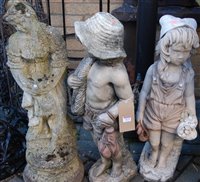 Lot 1172 - Three various reconstituted stone garden figures