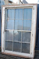Lot 1176 - A 19th century painted pine large sash window...