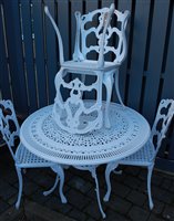 Lot 1177 - A contemporary white painted and pierced metal...