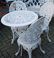 Lot 1179 - A Victorian style white painted and pierced...